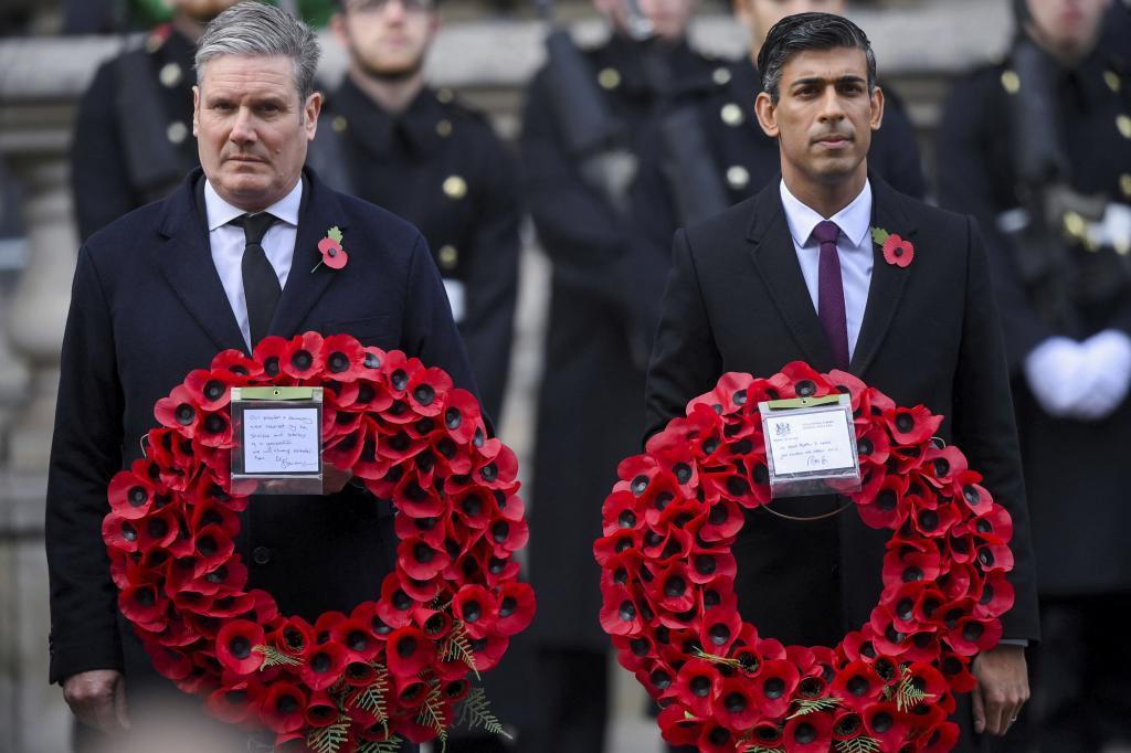 Jeremy Corbyn y Rishi Sunak, durante la ceremonia del Domingo del Recuerdo.